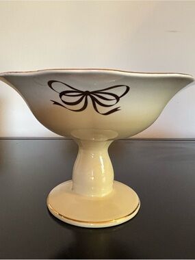 Cream Ceramic Pedestal Bowl with Brown Bow Motif